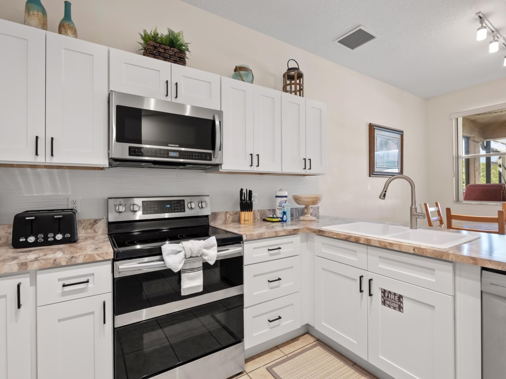 Kitchen Area with Microwave and Stove