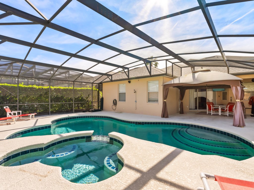 Pool with a Mickey Shaped Spa