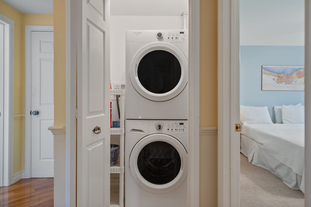 Stackable washer and dryer in closet on second floor - Sanibel North Vacation Home - Niagara-on-the-