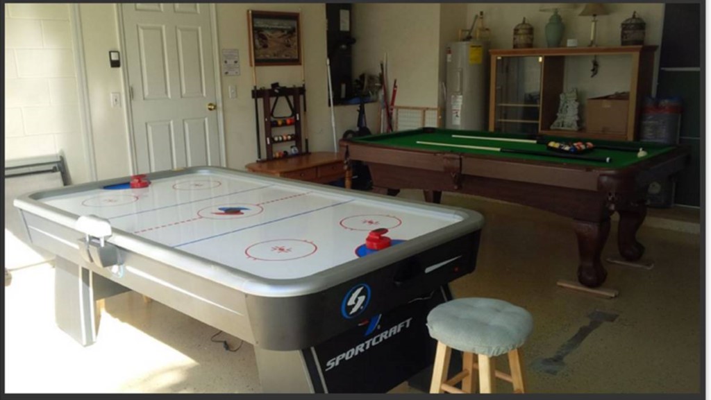 Games Room includes Pool Table, Air Hockey, Ping Pong Table Top, Pub Table and Couch. A Washer and D