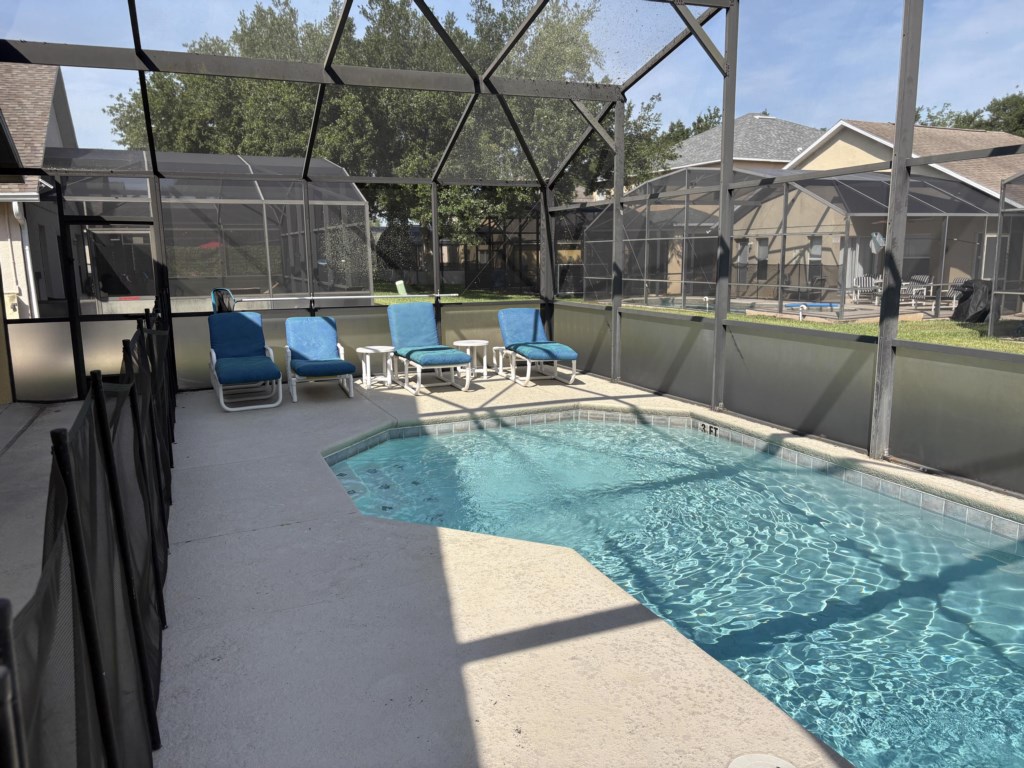 Extended pool deck with safety fence