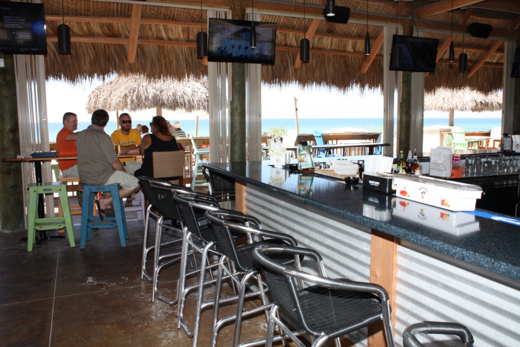 Beach dining at the Tiki Hut featuring live music seven nights a week