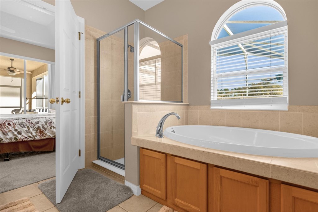 Master bath with large soaking tub and shower