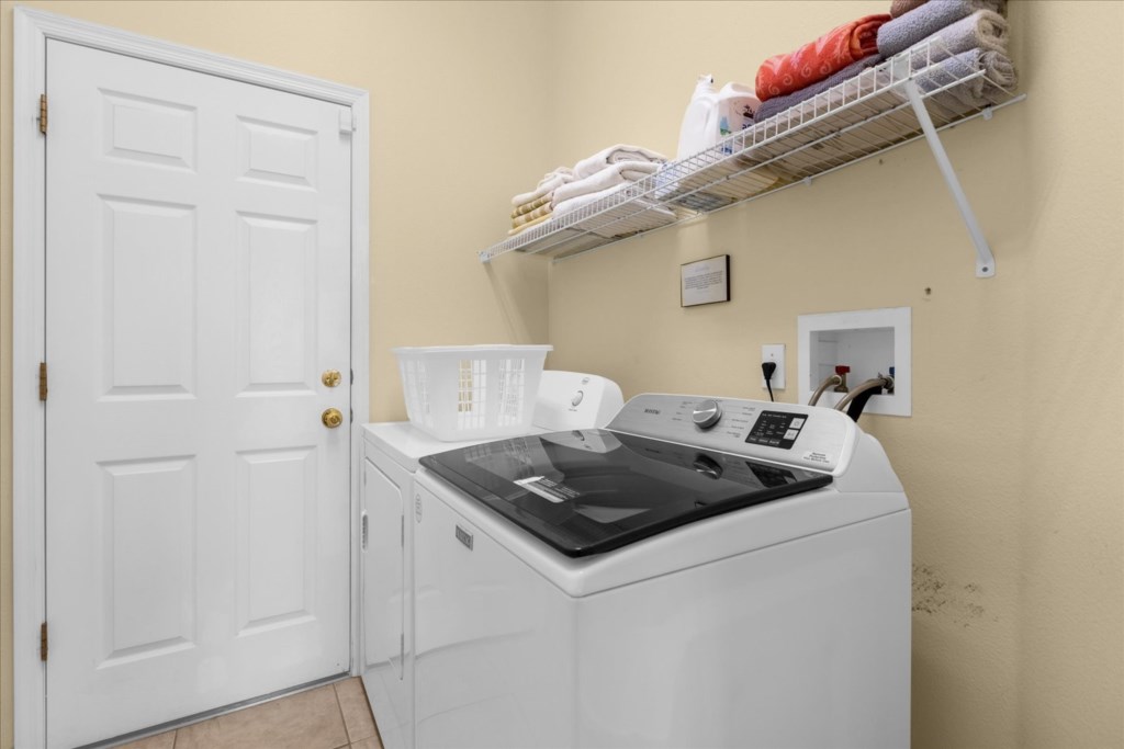 Full size washer/dryer in laundry room off of kitchen on first floor