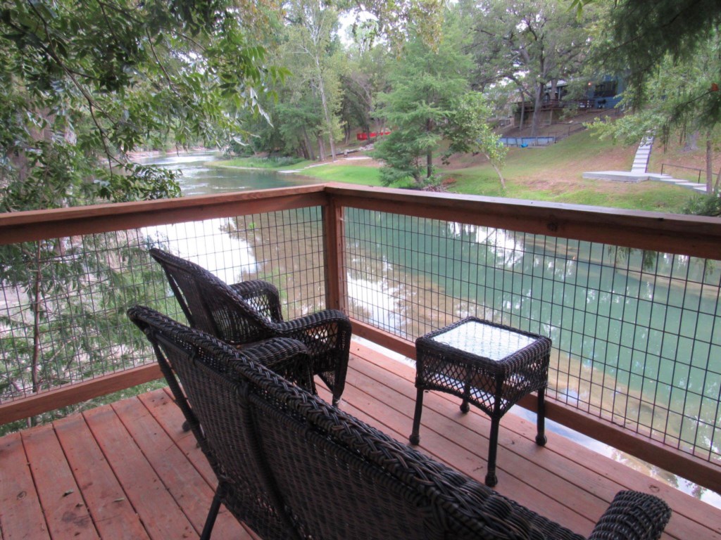 River front deck with seating for your morning coffee!
