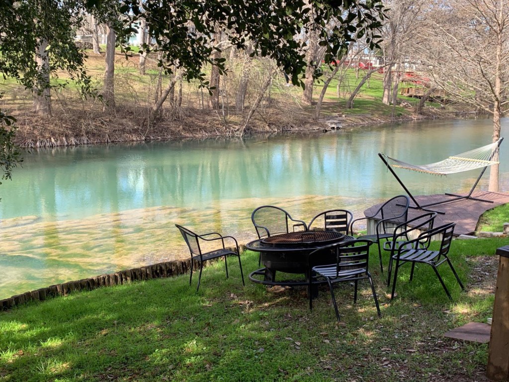 Plenty of seating by the Guadalupe River.