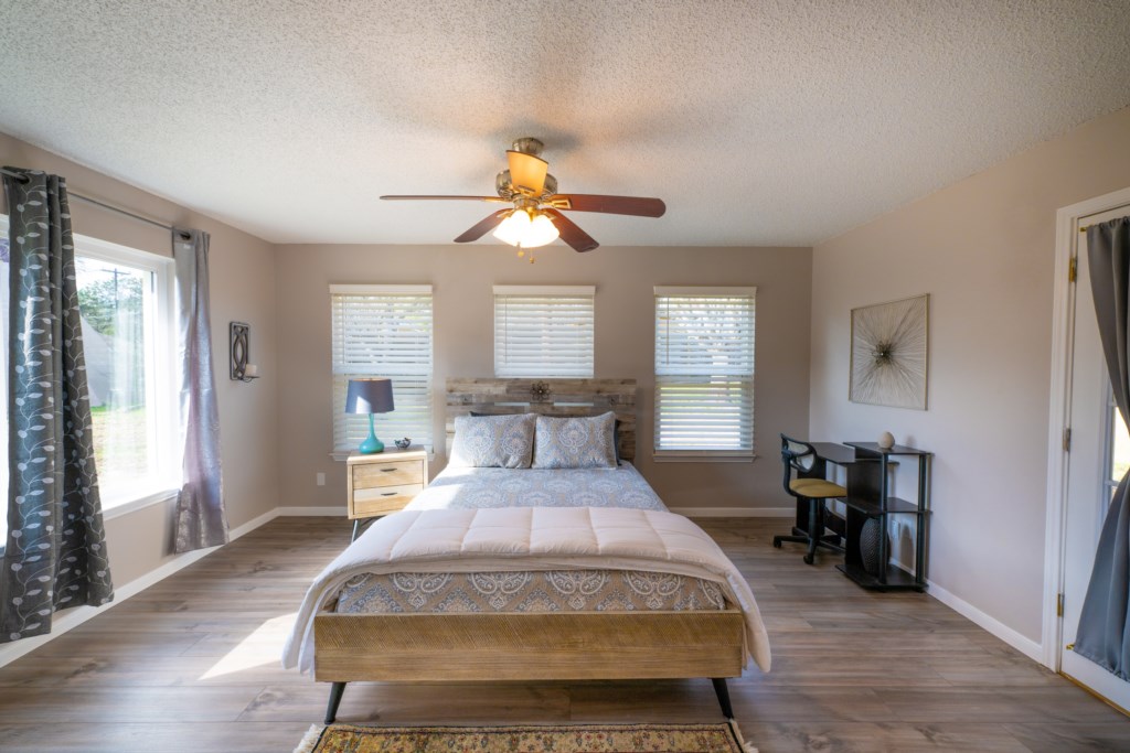 Master bedroom offers a Queen bed and lots of light!