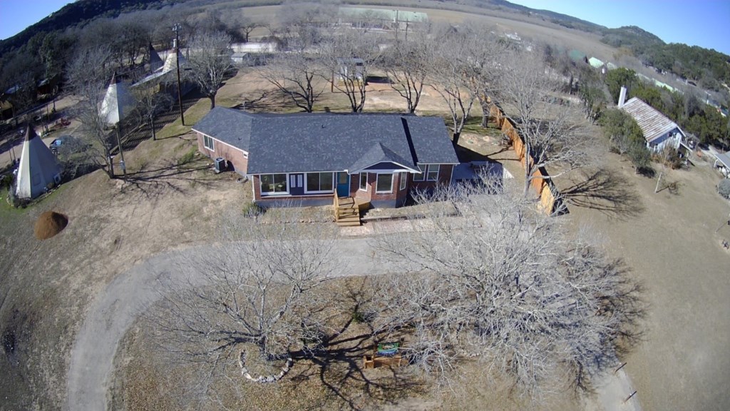 Aerial view of house & back yard.