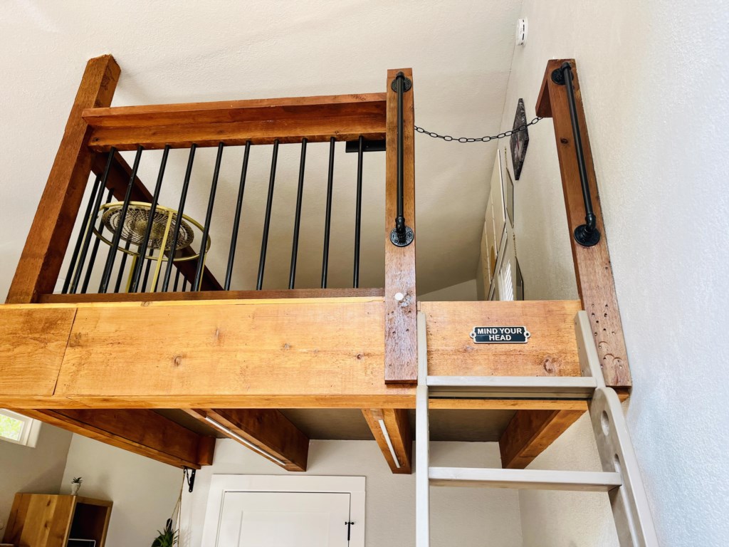 Ladder loft to cozy queen sized bed.