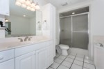 Large master bathroom with large soaking tub, walk in shower, and separate vanities.