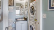 Full size washer and dryer are located in the master bathroom