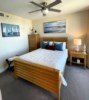 Bedroom #3 offers a full size bed, private balcony, and en suite bathroom.