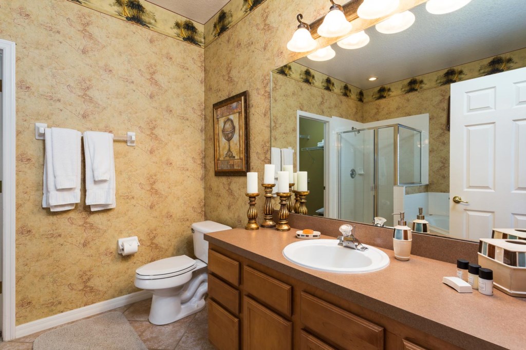 Master suite 1 bathroom with garden tub & glass door shower