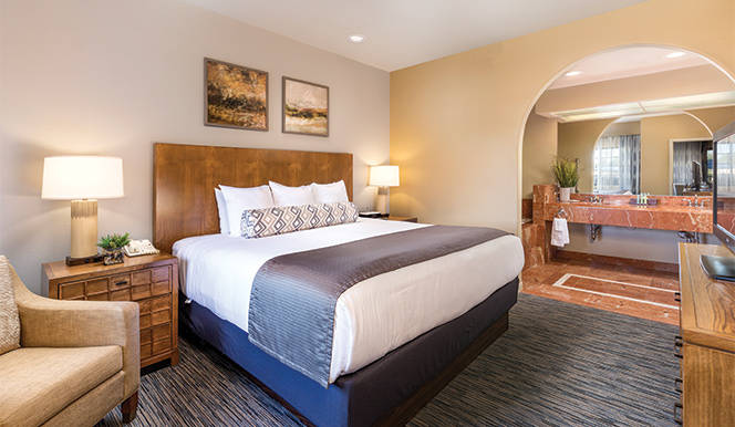 legacy-family-suite-bedroom-664x386_enhanced