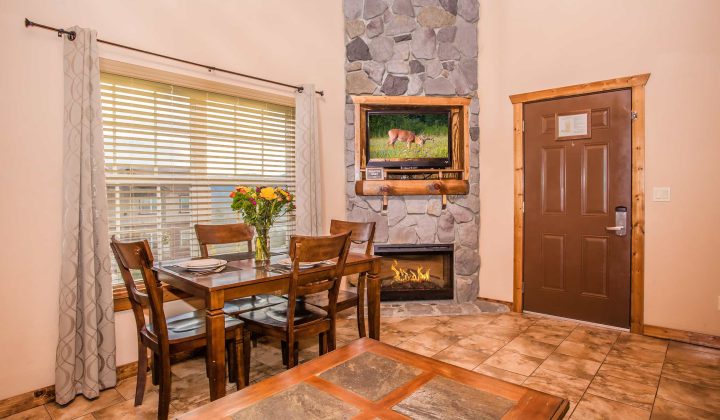 dining_fireplace_1BR_BA_lodges_at_great_smoky_mountains-720x420