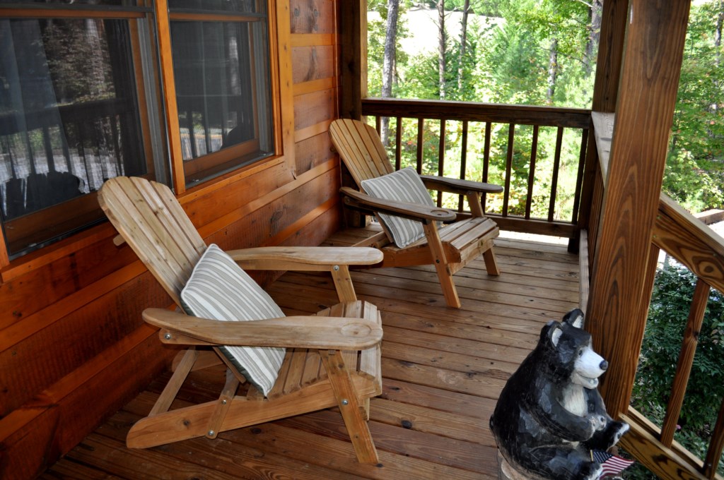 Comfortable adirondack chairs on the front porch