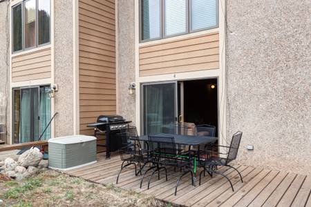 Private deck with seating for 6 and propane grill