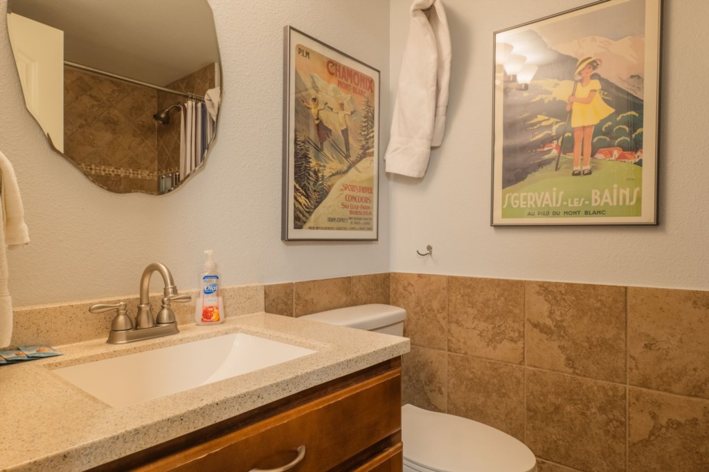 2nd floor hallway bathroom with full sized bathtub and shower.