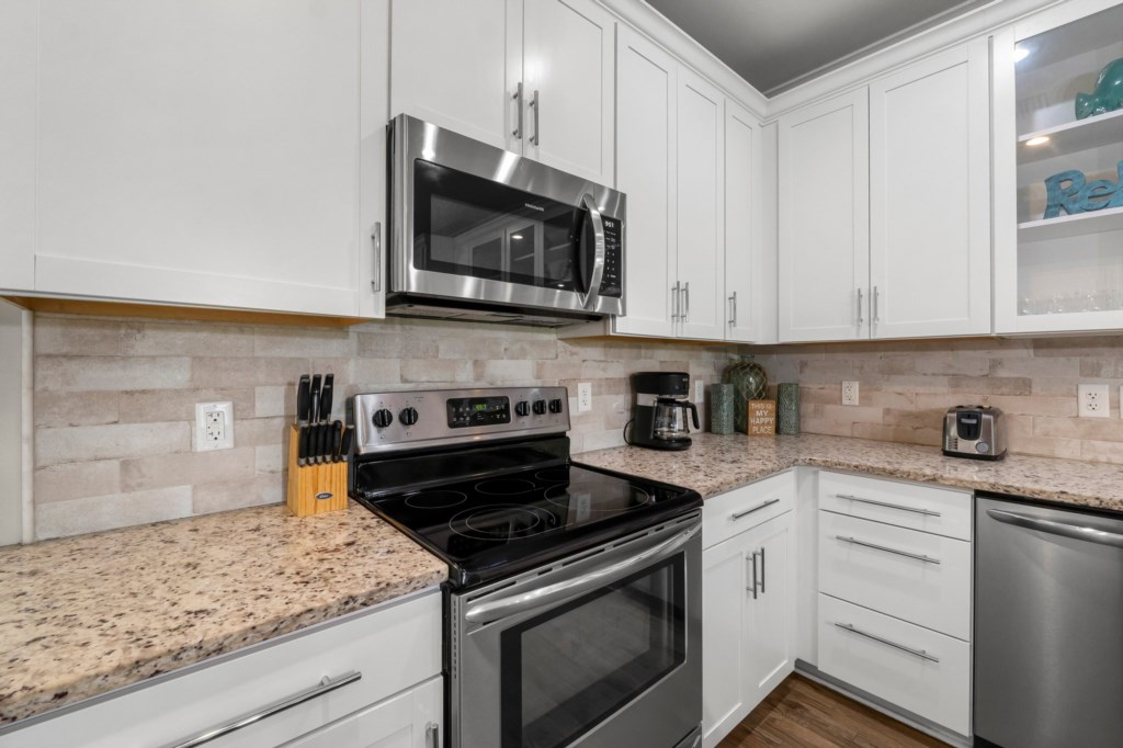 Spacious Kitchen With Modern Amenities Island Bar On 2nd Floor