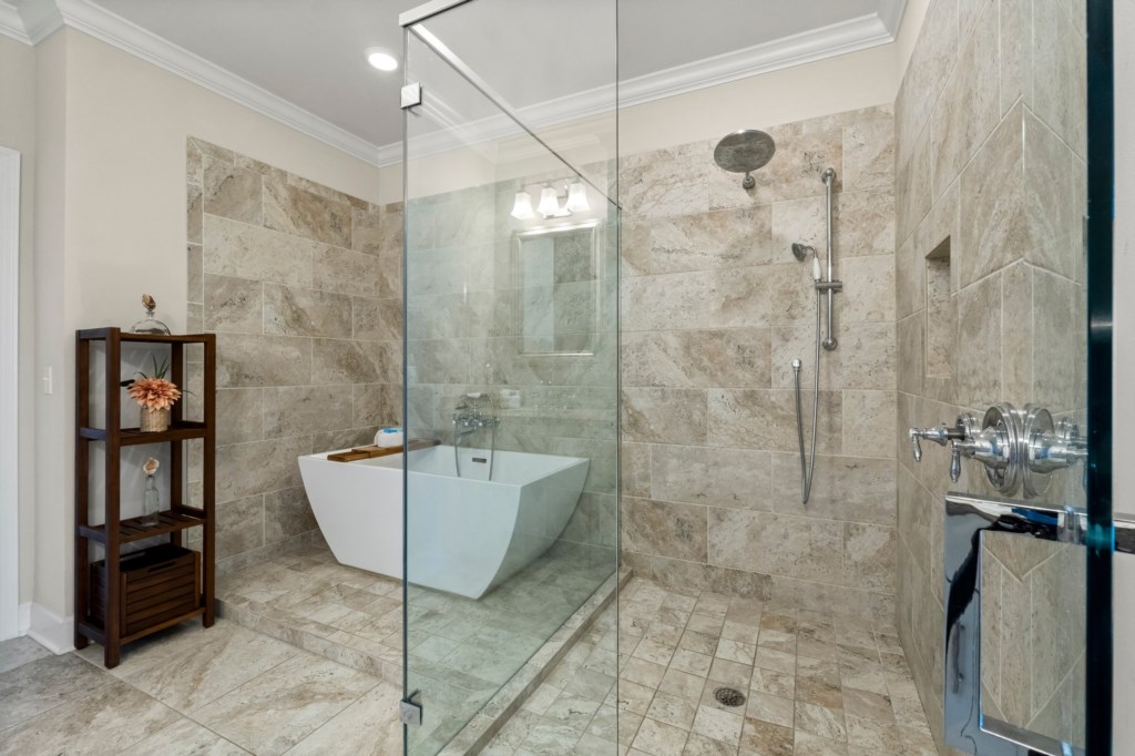 Bathroom With Walk-In Shower and Large Tub Connected to Primary King Bedroom