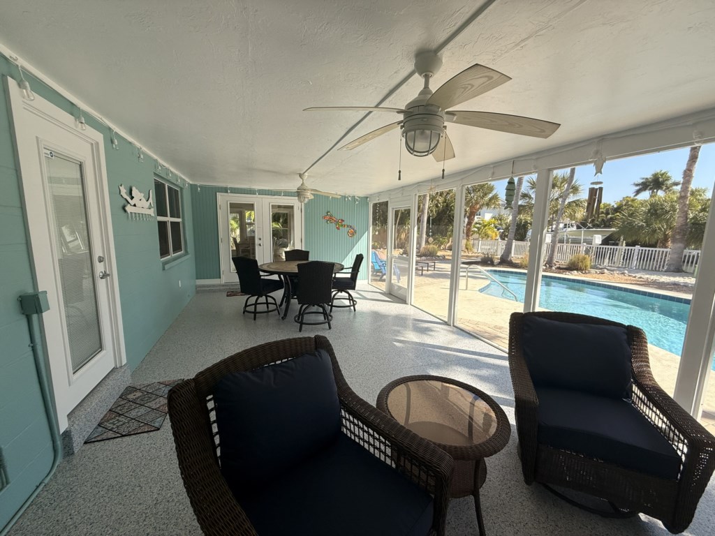 Patio with access to the hall bathroom and the pool