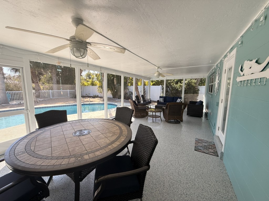 Patio with access to the hall bathroom and the pool