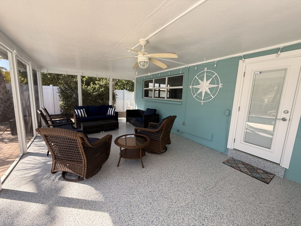 Patio with access to the hall bathroom and the pool