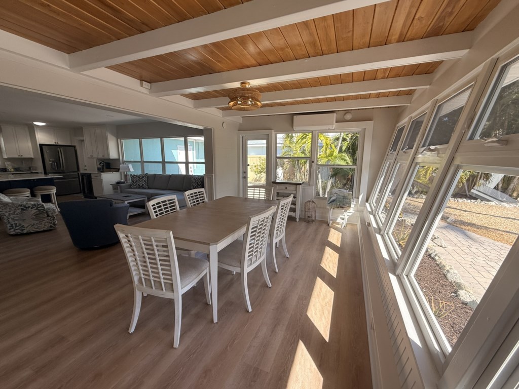 Dining room with access to grill and patio to the pool