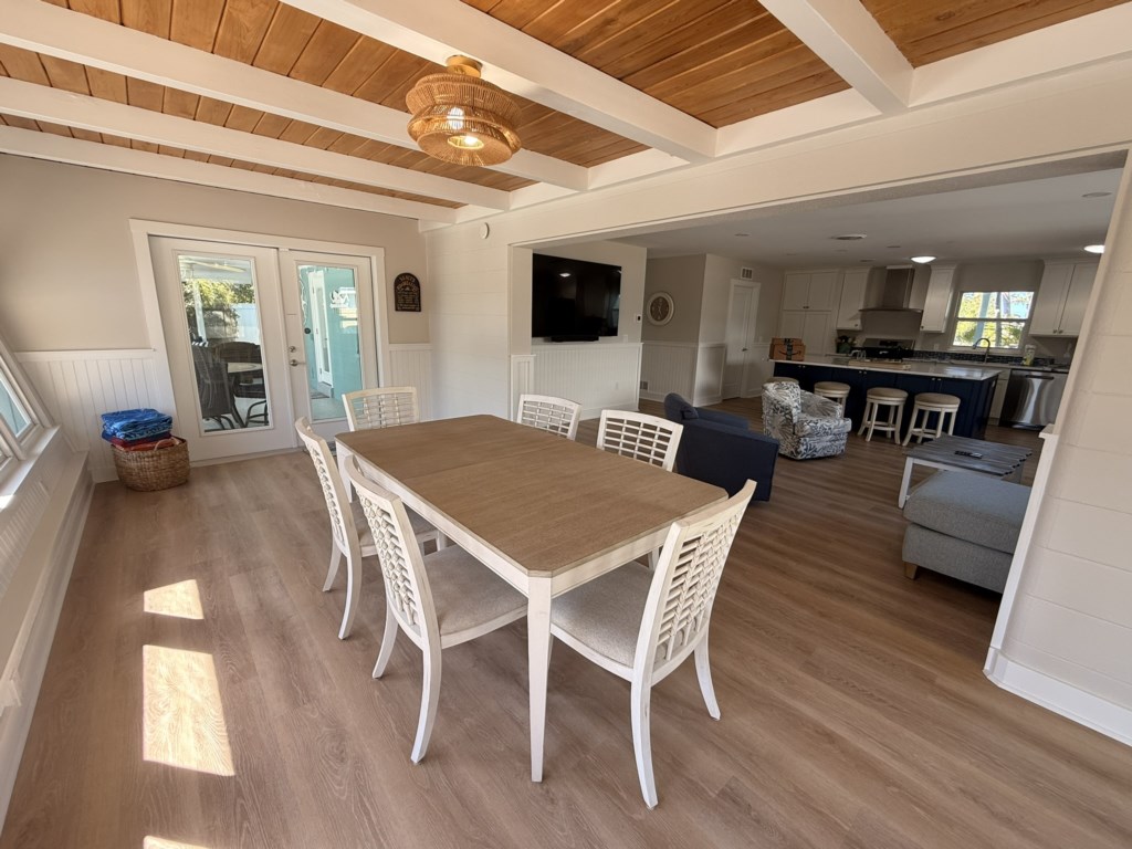 Dining room with access to grill and patio to the pool