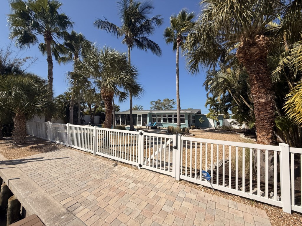 Gate to house from canal