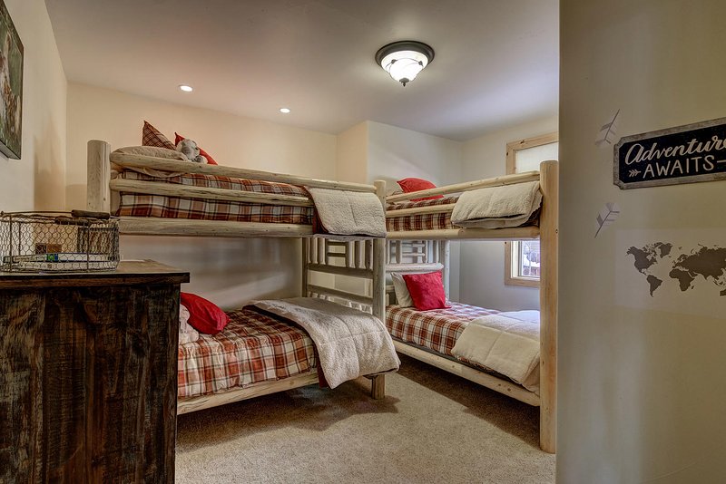 On main level Bunk Room with Twin sized Bunks and Full sized perfect for housing the kids