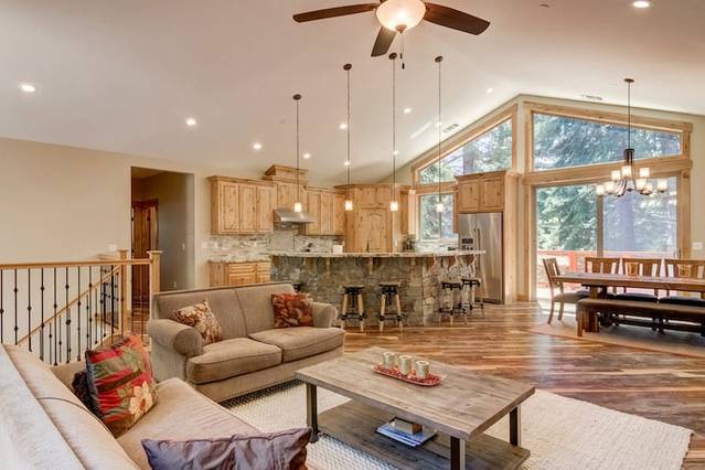 Rustic stone and wooden furnishings present a true cabin ambience