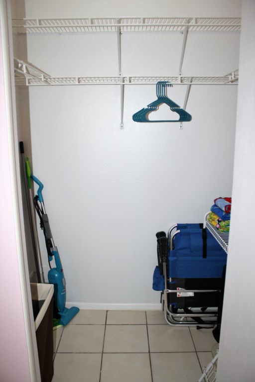 Large walk in closet with new sheets, towels, cleaning appliances, beach chairs and beach towels are included. 