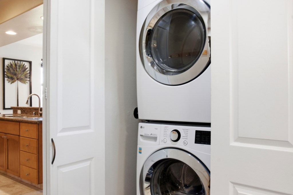 Convenient in-unit laundry with stackable washer and dryer.