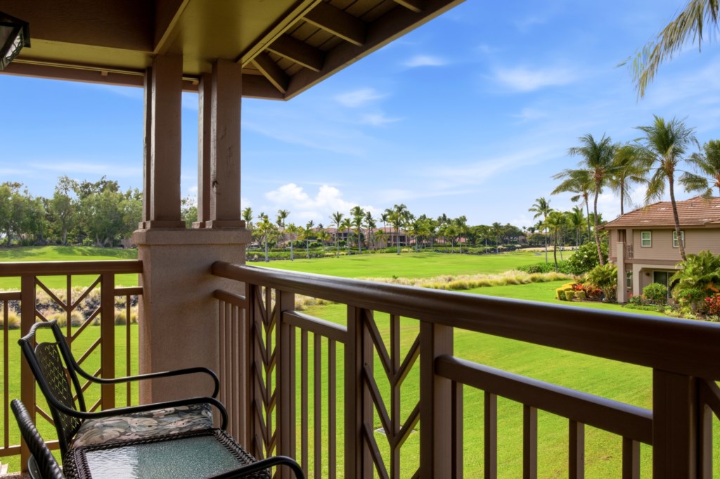 Relax on the balcony with stunning golf course views and tropical breezes.