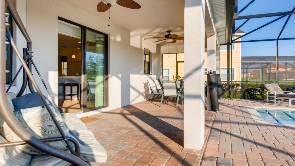 Spacious patio area also under roof