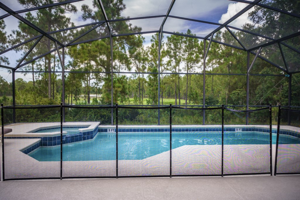 Pool with safety fence.jpg