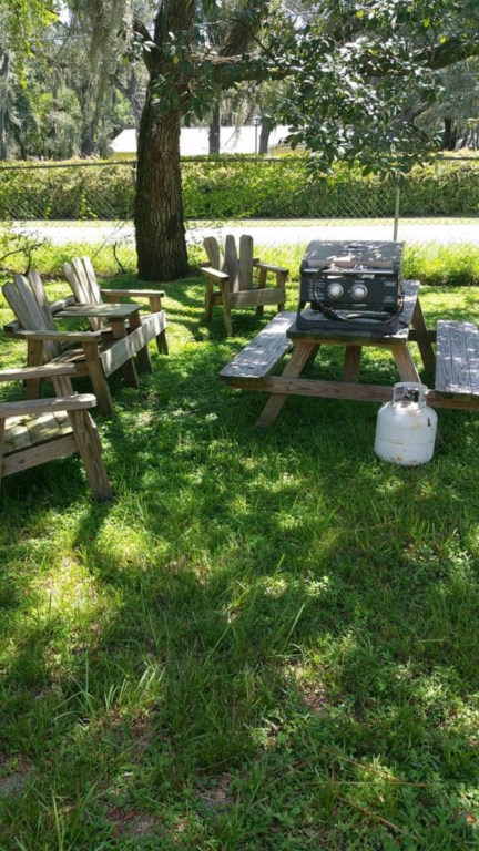 A gathering space to sit around and enjoy the outdoors while having a picnic area