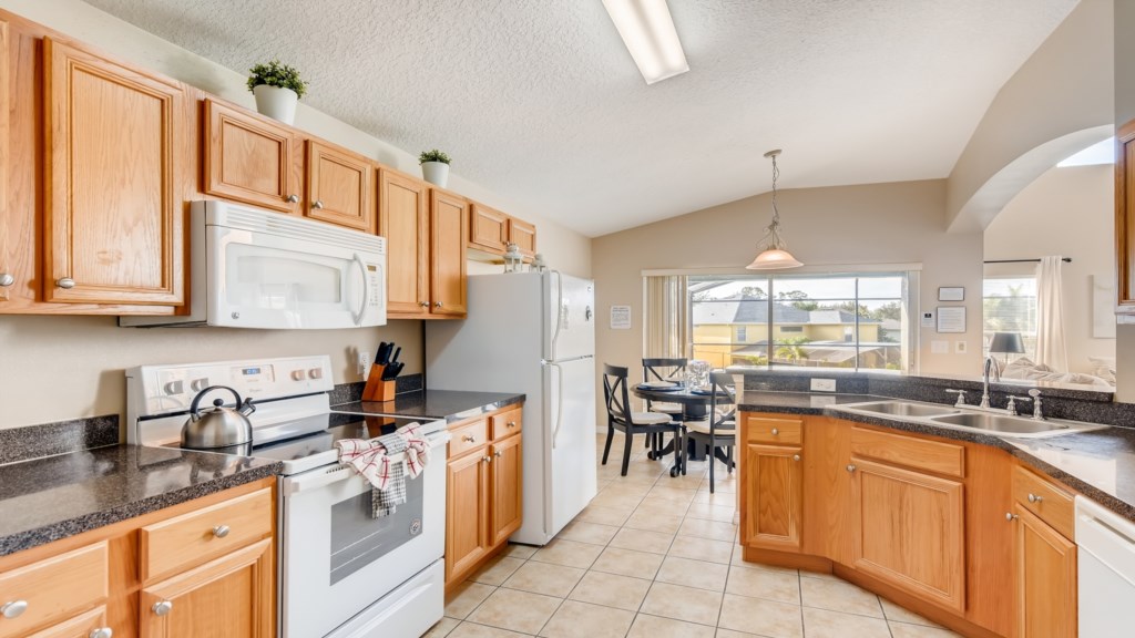 Kitchen with view of the pool