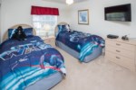 Fifth Bedroom with Twin Eurotop Mattresses and 40