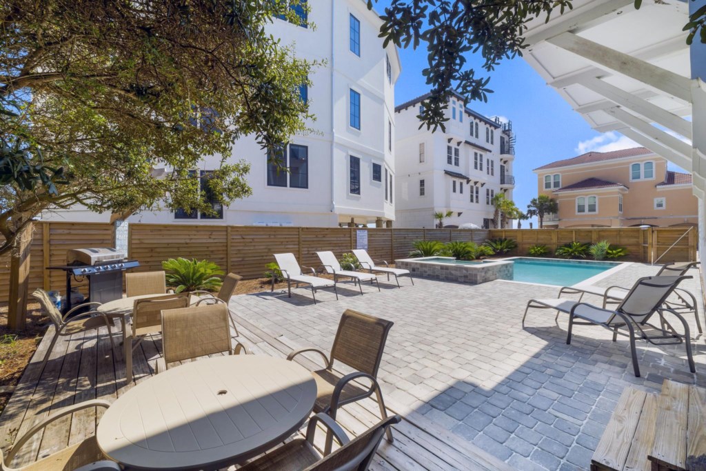 The Spacious Backyard Connects To The Beach