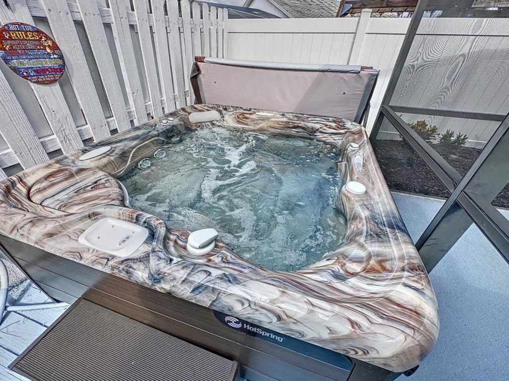Soak in the large hot tub 