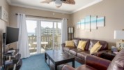 Enjoy your view of the bay from the living room or the balcony