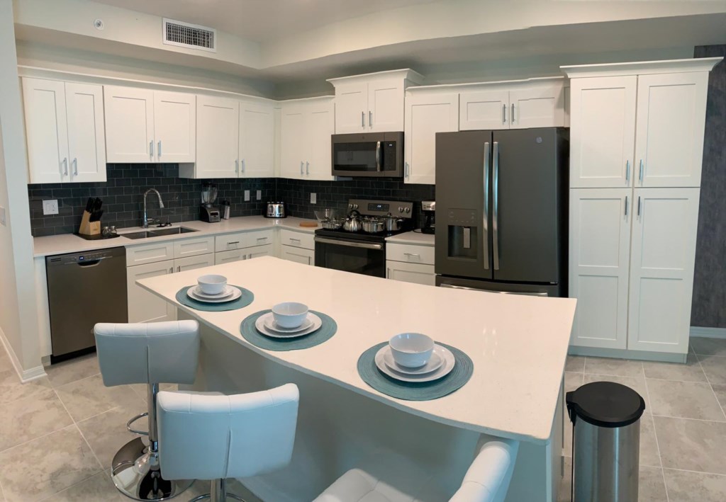 State of the art Kitchen with modern appliances and bar seating for 3 people.
