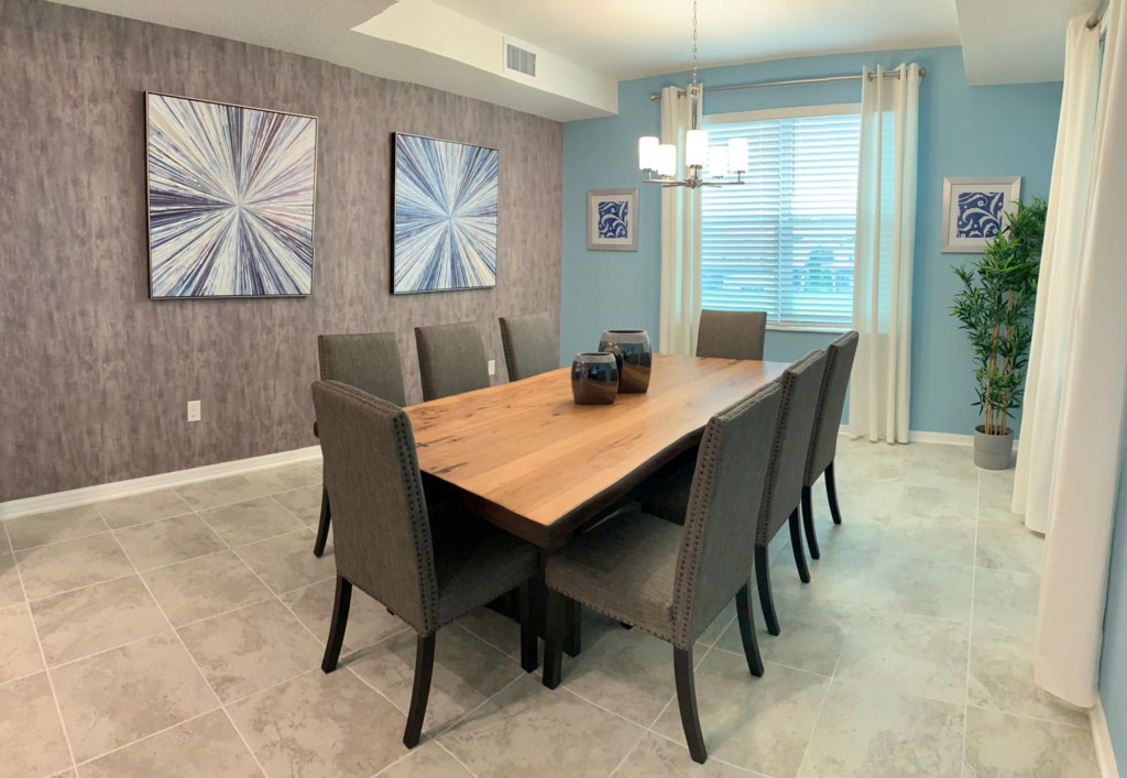 Spacious dining room area fits 8 people