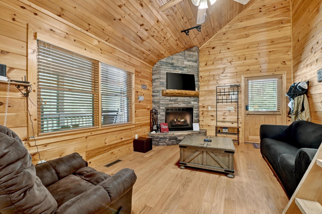 Living Room with Seasonal Wood Burning Fireplace
