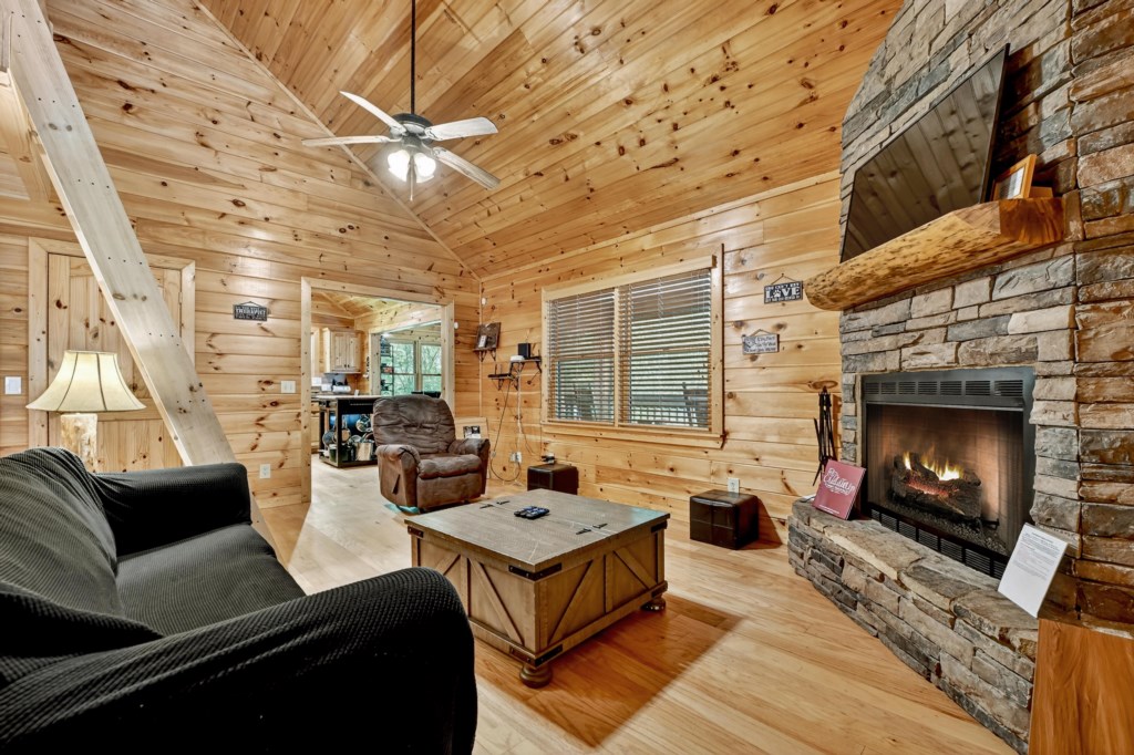 Living Room with Seasonal Wood Burning Fireplace