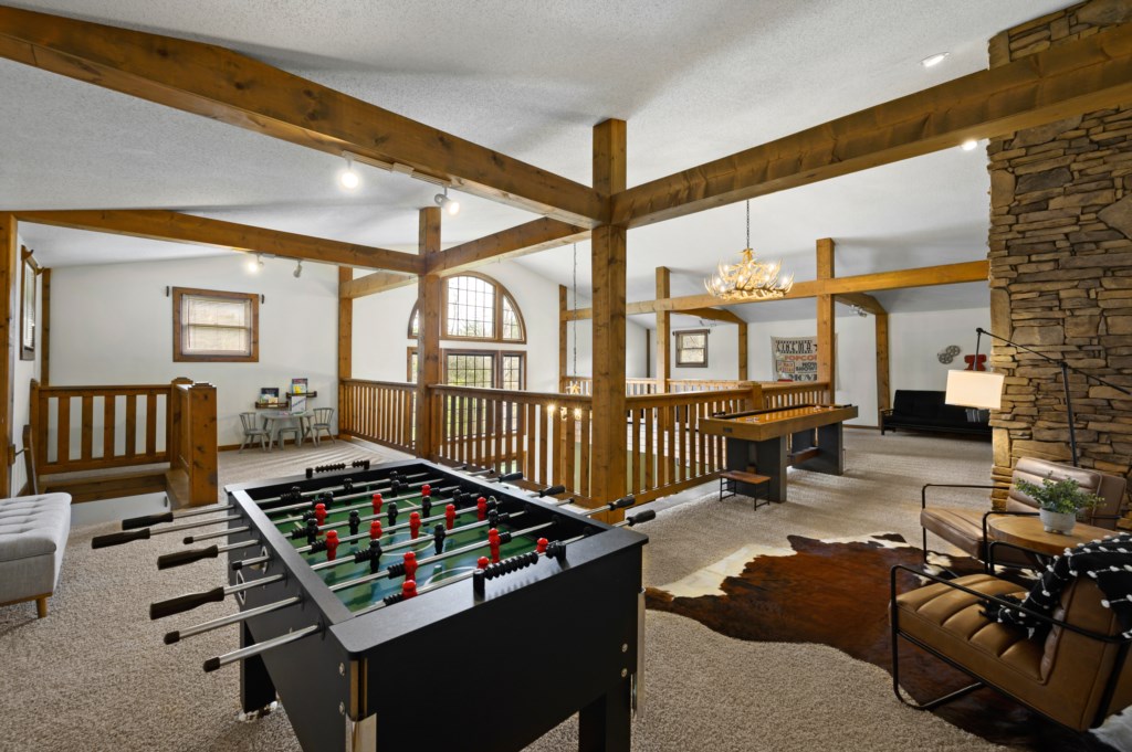 Upstairs contains foosball, table shuffleboard, pool, and other games!