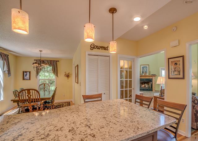 View from Kitchen work area toward the Family Room and Dining
