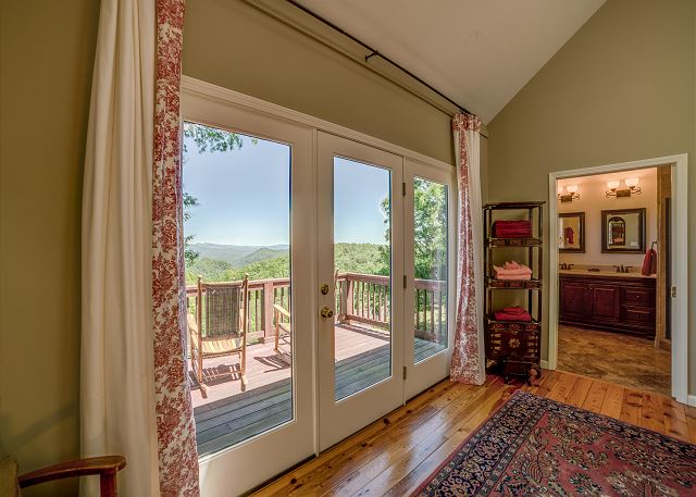 En-suite Bath in Main Level Queen Bedroom has 2 sinks and walk-in shower
